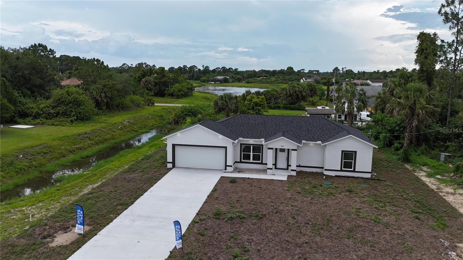Prime Location in Beautiful Lehigh Acres – Stunning Brand-New Construction!
Welcome to 842 Sentinela Blvd — a beautifully built home offering 3 spacious bedrooms, 2 modern bathrooms, and an oversized 2-car garage. Step inside to find an open-concept layout filled with natural light, porcelain tile flooring throughout, and tray ceilings that add a touch of elegance.
The contemporary kitchen features quartz countertops, a dual stainless steel sink, sleek white and black cabinetry, and a high-arc matte black faucet — perfect for entertaining. The primary suite offers a large walk-in closet and a bathroom with a fully tiled walk-in shower.
Enjoy Florida living with a large covered lanai, an oversized driveway ideal for extra parking, and a massive backyard with plenty of space for a future pool, garden, or playground. Additional highlights include a full laundry room with utility sink, LED recessed lighting, and impact-resistant windows.
Located in a quiet, desirable neighborhood of Lehigh Acres with no HOA and convenient access to main roads, schools, and shopping.
Move-in ready and waiting for its first owner!