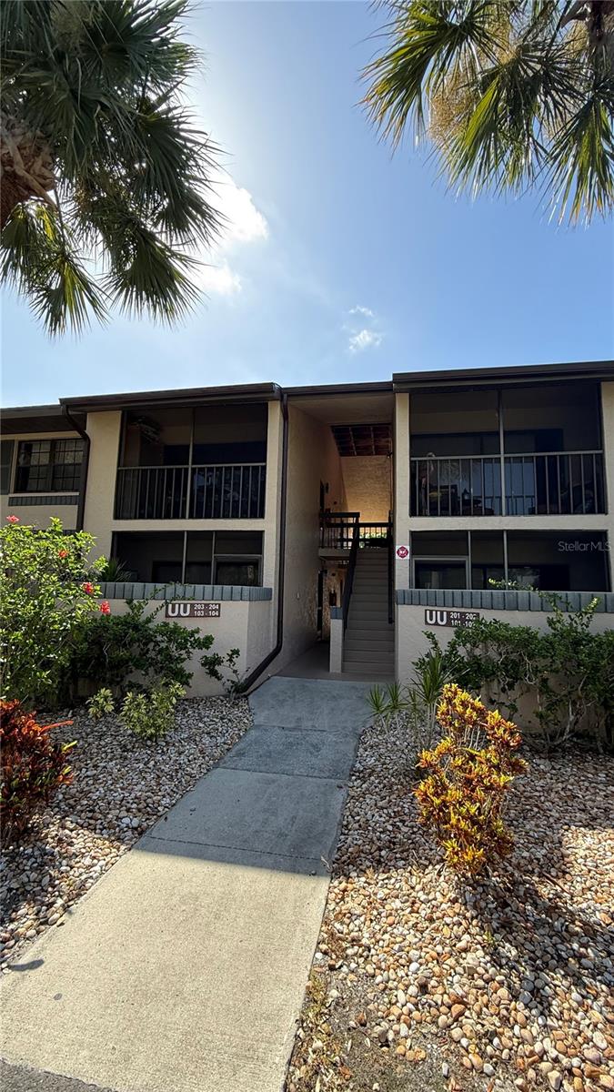 This move-in ready, ground floor unit in Oaks IV offers comfort, convenience, and a prime location. The open kitchen layout features stainless steel appliances and plenty of counter space, while the in-unit front-load washer and dryer make everyday living a breeze. Relax in a desirable setting and take advantage of the community amenities, including a clubhouse, bocce ball, shuffleboard, picnic areas with BBQ grills, and charming oak-lined walking paths. Schedule your private showing today this one won't last long!
