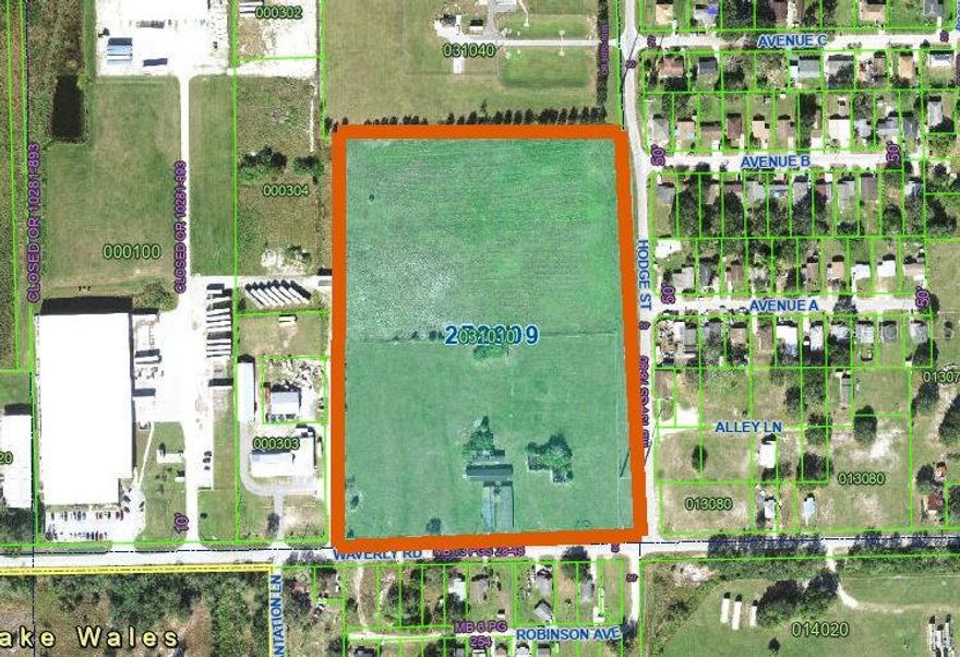 Almost 14 Acres of land zoned Commercial/Industrial. Suitable for phased development.  The property has two separate fenced areas. Ideal opportunity for developers. Four buildings on the property; however, the value is in the land.