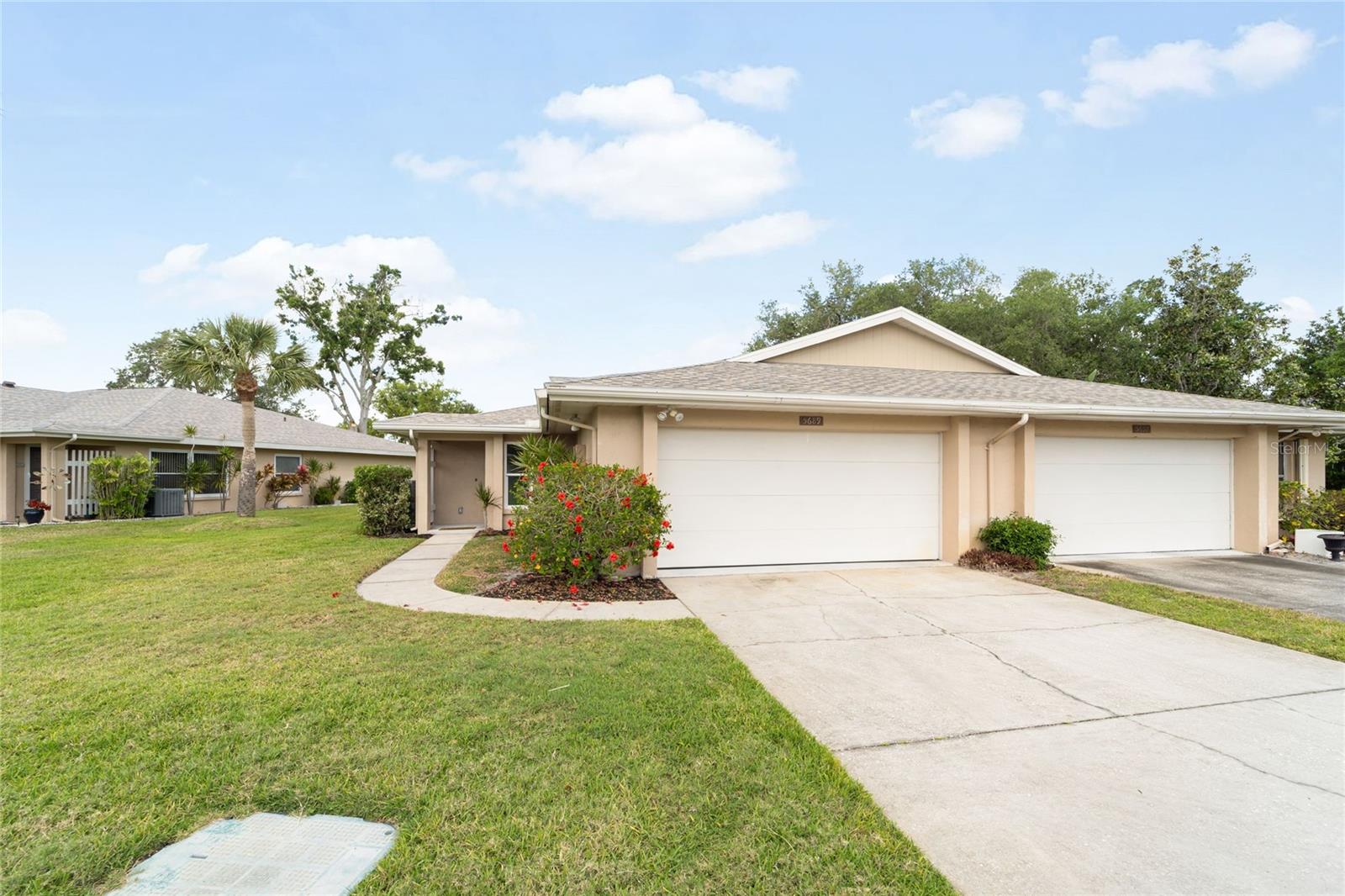 Welcome to this stunning 2-bedroom, 2-bathroom villa in the highly sought-after Center Gate Village! Recently and completely remodeled, this home boasts modern finishes and a fresh, contemporary design throughout. From the updated kitchen with sleek countertops and new appliances to the stylish bathrooms featuring elegant fixtures, no detail has been overlooked. The spacious living areas provide a bright and inviting atmosphere, while the private patio provides a perfect spot for relaxation. With everything updated to perfection, this villa offers the ultimate in comfort and convenience, all within a prime location. Not to mention the large 2-car garage, and sparkling community pool! Come see it today!