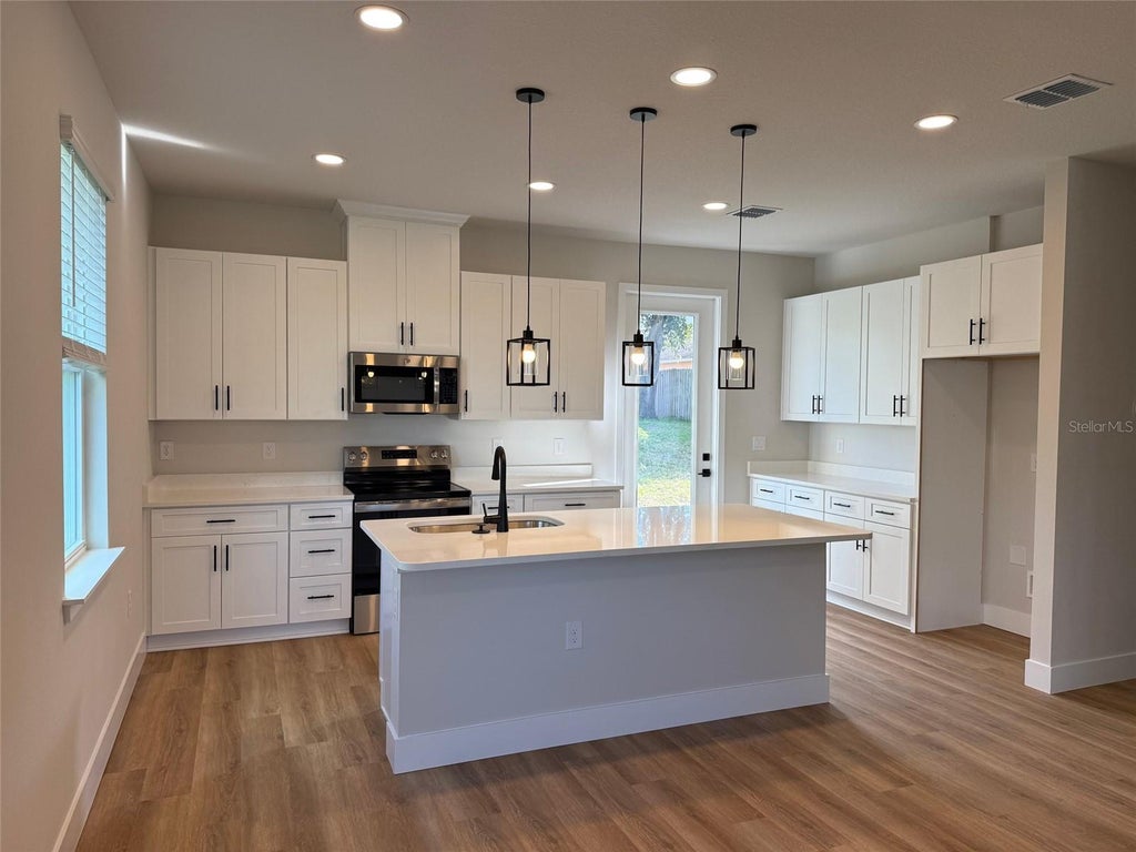 Photo of 8590 Blackberry Avenue, Orlando, FL 32825 (MLS # O6445060)