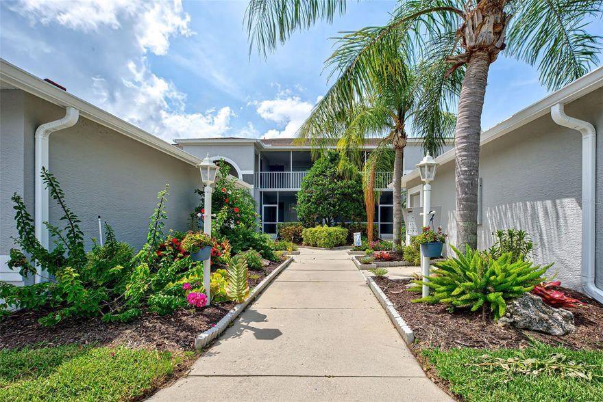 Under contract-accepting backup offers. Have you been waiting for the perfect condo.  Well, your wait is over!  This remarkable property boasts a total makeover where fabulous designer touches abound.  Offering 2 bedrooms, 2 baths, soaring cathedral ceilings in a spacious 1333 square feet of inviting open floor plan.  With the walls removed, the updated kitchen features beautiful wood cabinets with crown accents, counter height granite countertops, new stainless appliances, and lighting.  Your eyes are seamlessly drawn to the outdoors with gorgeous luxury vinyl plank flooring throughout the living areas.  The owner’s suite features a lovely bay window, wood laminate flooring and ensuite bath to die for.  New vanity cabinets with quartz countertops, contemporary square sink and sleek faucet provide plenty of storage.  The newly designed shower has subway tile walls and lovely mosaic pattern flooring.  Generous linen closet for all those additional items.  The guest bedroom and bath separated from the owner’s suite for privacy has also been updated with new white cabinetry, dramatic quartz countertop, square sink, new faucet, mirror and lighting.  Enjoy the morning sun and gorgeous sunsets from either of the two lanai’s both featuring new ceramic tile.  Dine alfresco on the rear lanai with breathtaking views overlooking the golf course and lake.  Sip cocktails on the front lanai while taking in some of Florida’s spectacular sunsets.  Inside laundry room with a large closet for pool and beach gear.  For peace of mind this condo has been re-piped and offers a new AC (2022) and hot water heater.  Just when you thought it couldn’t get any better this outstanding property comes turnkey furnished with some exceptions.  Located in the ever-popular Stoneybrook Golf & Country Club.  This gated community boasts a challenging 18-hole, par 72 Arthur Hills designed golf course, a stunning clubhouse, exceptional dining & lounge.  Lighted har-tru tennis courts, pickleball, fitness center, heated pools, picturesque walking trails and active social calendar complete this perfect country club setting.  Located just minutes from shopping, restaurants, and the powder white sands of world-renowned Siesta Key Beach.