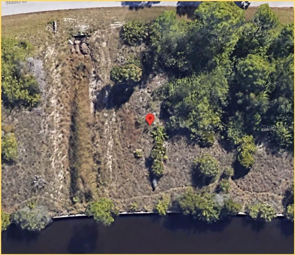 Photo of 8301 Dafoe Street, Port Charlotte, FL 33981 (MLS # D6137738)