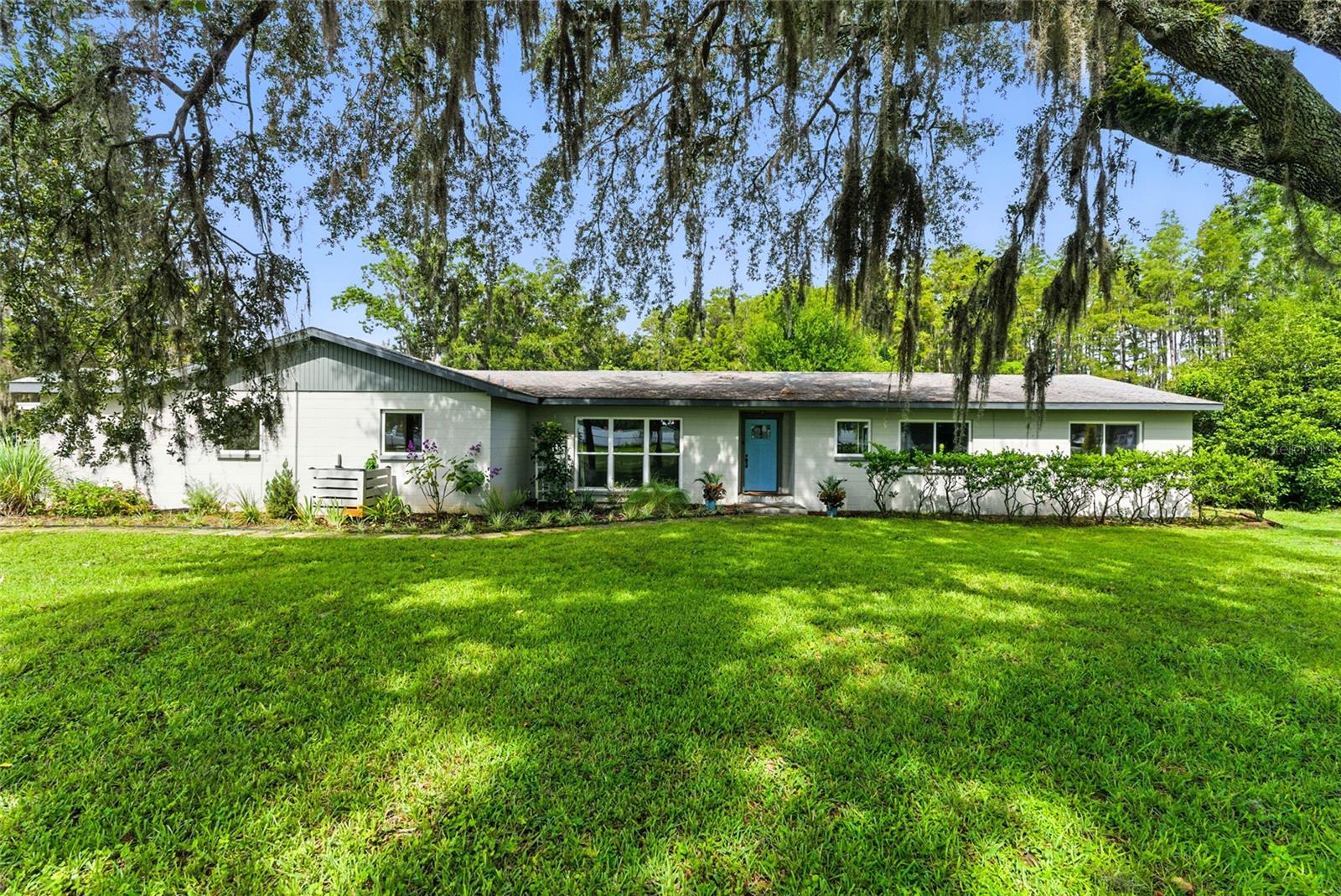 Tired of the hustle bustle of city living or communities with HOA rules? This is your chance to rent a beautiful country retreat conveniently located in the middle of it all. Nestled among beautiful trees and vibrant wildlife, this 2,800+ sqft, 4-bedroom, 3-full bathroom home offers the best of both worlds. Step inside a light and airy interior that feels both grand and welcoming. Enjoy a spacious layout with distinct, light-filled living areas, a cozy stone fireplace, and a private library for work or relaxation. The in-law suite is perfect for guests or multi-generational living, while a no HOA community means you can bring all your toys! Water is provided by a private well, which means no monthly water bill! With lake access for kayaking, fishing, and an abundance of local wildlife, every day feels like a vacation. Beyond your tranquil retreat, you're perfectly positioned to enjoy everything the area has to offer. The home is zoned for top-rated schools, including Charles S. Rushe Middle School and Sunlake High School. You’re just a short drive from local restaurants and the Tampa Premium Outlets for shopping. Commuting is a breeze with easy access to I-75 and the Veterans Expressway, putting downtown Tampa and Tampa International Airport just 30 minutes away. This unique opportunity won't last long. Schedule your private tour today!