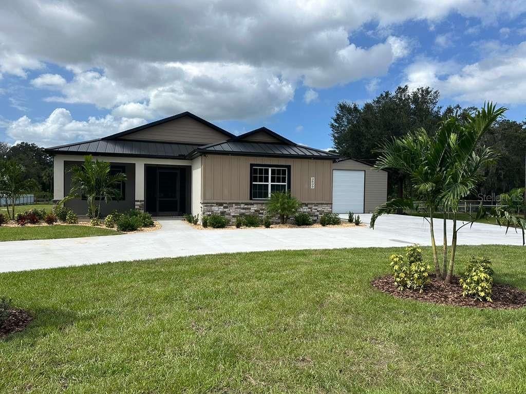 Photo of 8308 Gibson Oaks Drive, Lakeland, FL 33809 (MLS # L4959221)
