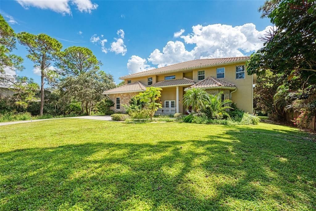 Photo of 1648 Bayshore Drive, Englewood, FL 34223 (MLS # TB8431518)
