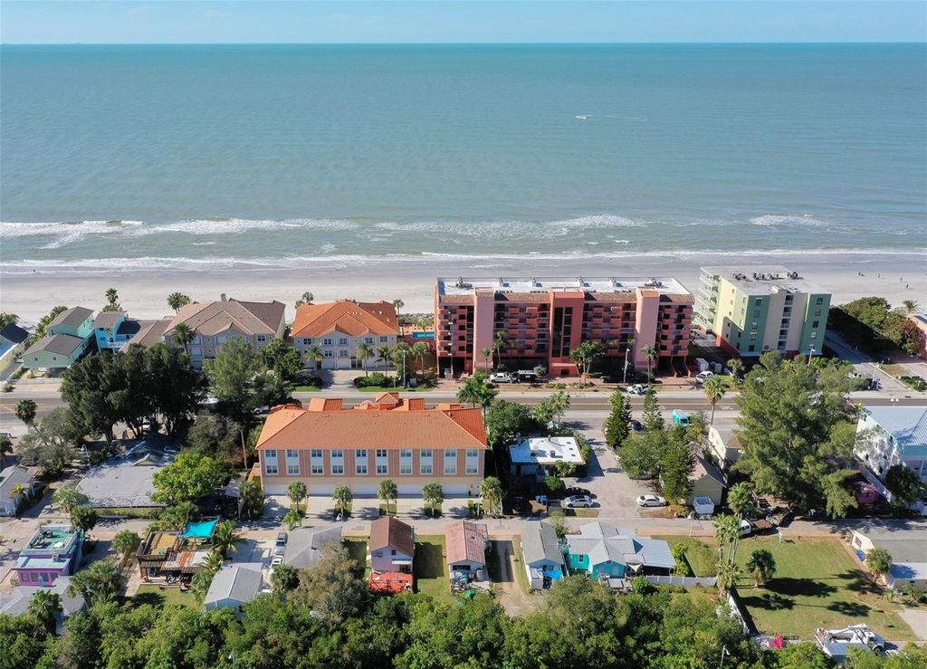 Photo of 19215,19217,19219 Whispering Pines Drive, Indian Shores, FL 33785 (MLS # U8225080)