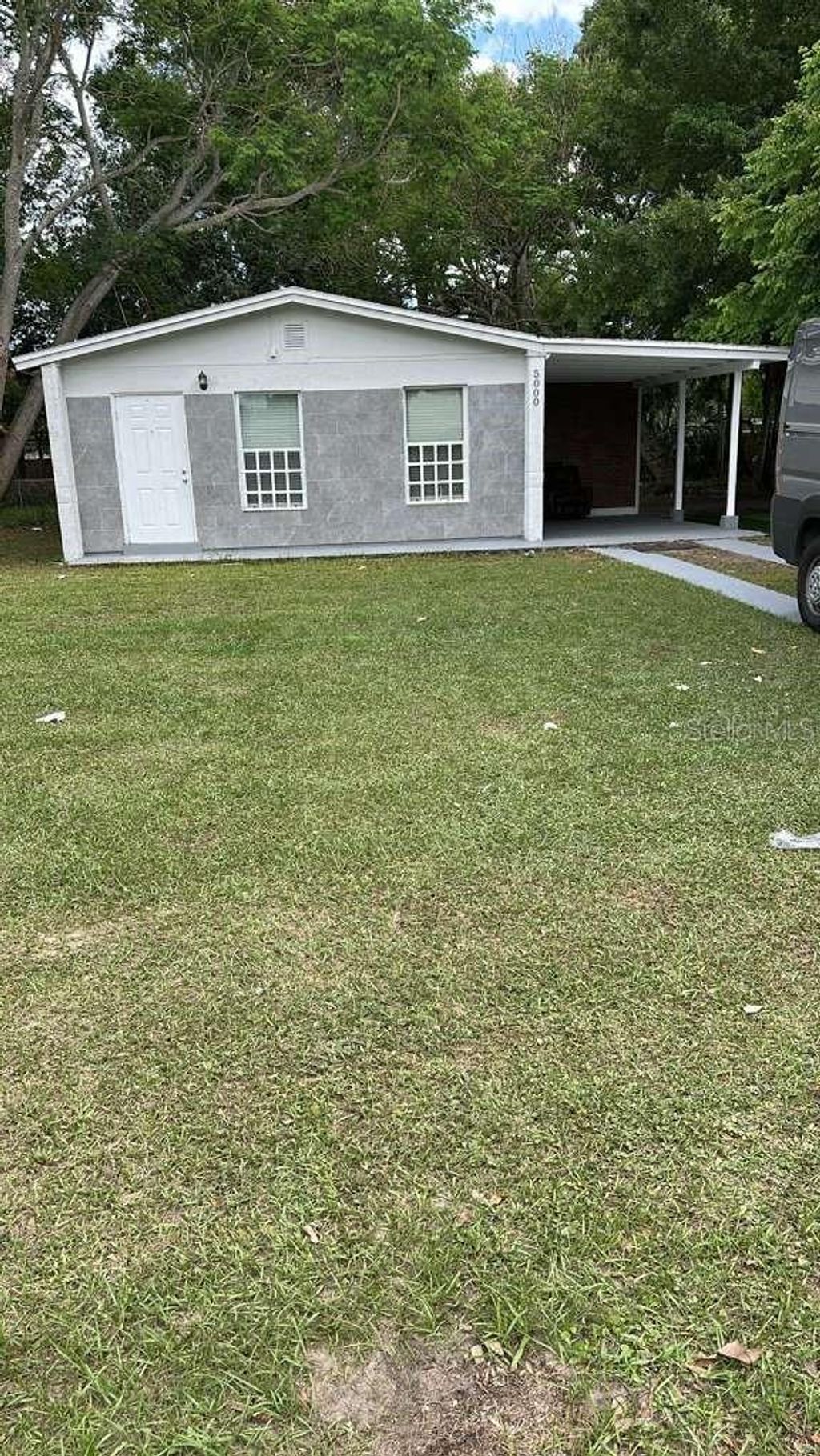 Photo of 5000 Manduria Street, Orlando, FL 32819 (MLS # O6399000)