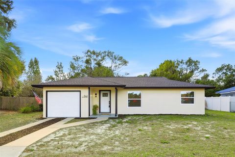 Photo of 1542 Fort Smith Boulevard, Deltona, FL 32725 (MLS # O6369577)