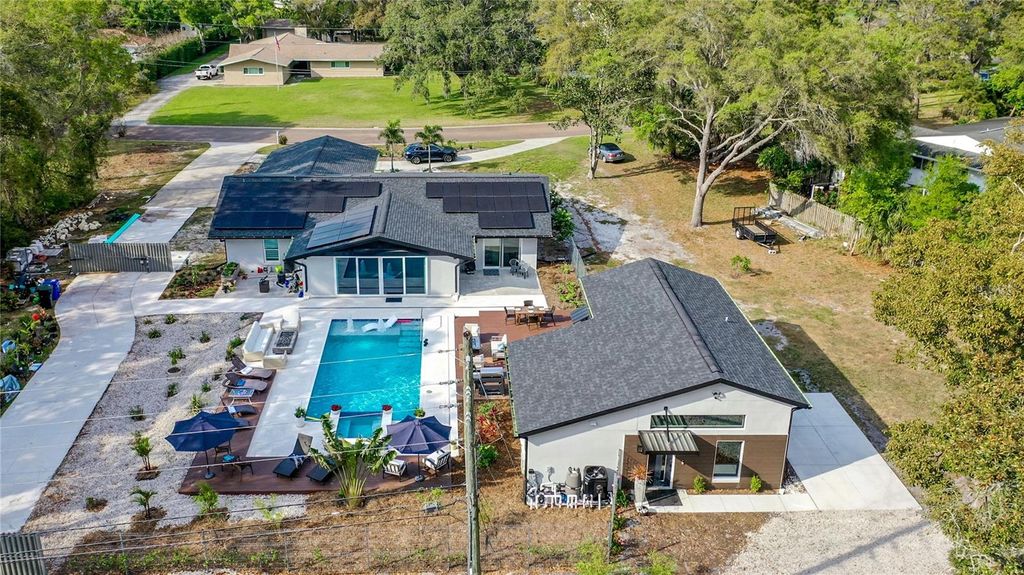 Photo of 1851 Royal Oak Place E, Dunedin, FL 34698 (MLS # O6391923)