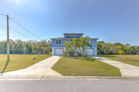 Photo of 4010 Jewfish Drive, Hernando Beach, FL 34607 (MLS # TB8358419) Photo of 4010 Jewfish Drive, Hernando Beach, FL 34607 (MLS # TB8358419)