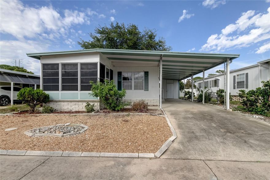 Fractional Ownership. Desirable "STONEHEDGE ON THE HILL" Quiet and Peaceful! Just in time for the Holidays! AFFORDABLE, ACTIVE, ADULT 55+ Mobile Home Community! Pet Friendly Section! NO LAND LEASE! 2 Bedroom, 2 Bath, Eat In Kitchen, Great Room Floor Plan with Enclosed Front Patio Plus Large 3 Vehicle Deep Carport and Shed! Both Bedrooms have Walk In Closets! Just Needs a Little TLC.  Improvements Include: NEWER- PLUMBING- RE-PIPED in 2021 Year, NEWER WHITE REFRIGERATOR Winter (2021 Yr)! NEW WASHER (2022)! NEW A/C SYSTEM(2021)! NEWER ELECTRIC WATER HEATER (Aug 2021)! Plenty of Storage! Ceiling Fans! LOW HOA FEES COVER: Outstanding Clubhouse with Heated POOL, Shuffleboard Court, Water, Sewer, Trash, Lawncare, Basic Cable and Internet, Exterior Pest Control and Street Lights! Golf Cart Friendly! HOA Approval is Required. Buyer Must contact the Association for Approval. Background and Credit Check as well as In Person Interview with Board Members. Ample Guest Parking! PRIME LOCATION! Nearby Fred Howard Park Beach, Anclote Boat Ramp, Water Sports, Rentals, Numerous Nearby Golf Courses! Easy Access to Tampa International Airport and Shopping. ENJOY THE FLORIDA LIFESTYLE .. Schedule an Appointment Today!