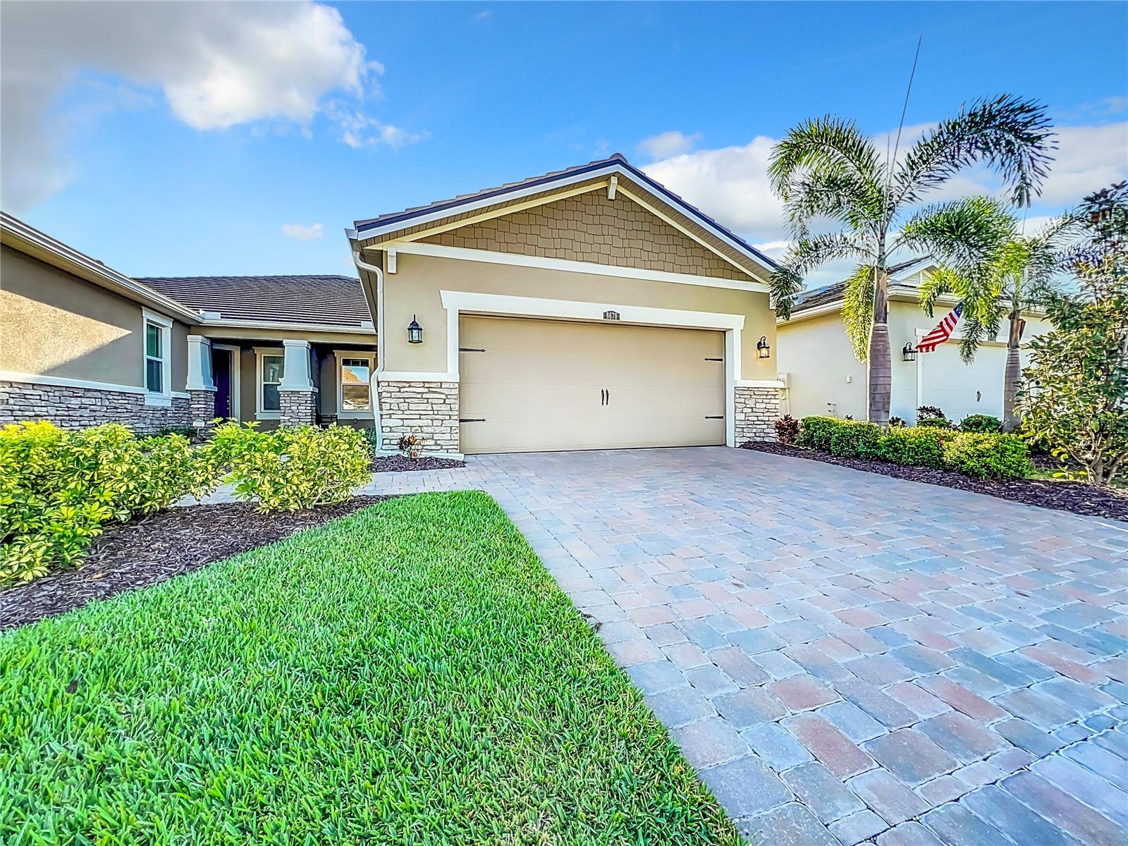 FURNISHED & MOVE-IN READY NOW!!! SUNRISE PRESERVE VILLA AT PALMER RANCH – Built in 2020 by Mattamy Homes, this 2 BEDROOM 2 BATH +DEN & 2 CAR GARAGE VILLA is PRISTINE & READY IMMEDIATELY – NO NEED TO WAIT FOR NEW CONSTRUCTION! Mattamy’s Seascape floor plan is the largest of the villa floor plans in Sunrise Preserve and is highly coveted, yet rarely available – don’t miss this opportunity. Great curb appeal with a craftsman cottage vibe and paver driveway and entryway makes this home warm & welcoming! Upon entry into the foyer, you’ll find a comfortable flex room currently being used as an office. Continue to the main living area - an OPEN CONCEPT space – including the kitchen, dining room and living room. The gourmet kitchen with a walk-in pantry features an expansive island with quartz countertops and is excellent for entertaining. Stainless appliances include the side-by-side refrigerator, dishwasher, large single sink, microwave oven and gas range. Timeless Shaker-style 42” cabinets in rich warm tones complete the design. The split floor plan offers you and your guests privacy with the 2nd bedroom and guest bathroom at the front of the house while the master suite is at the back of the home. The warm, neutral themed finishes are carried out with 17” square ceramic tile flooring in the main living areas and carpeting in the bedrooms. Your master suite with its three windows is light and bright! The ensuite master bathroom has a dual sink vanity, a spacious walk-in shower with built-in bench seat and a very generous master closet. Three large sliding glass doors take you from the living room out to the lanai with brick pavers. If privacy is important to you, you’ll love the privacy of the lanai and backyard setting. The seller is including the furnishings as well as washer & dryer. Sunrise Preserve is an amenity-rich community offering resort-style living at its best! You won’t run out of things to do – whether it be playing tennis, pickleball, bocce ball or enjoying the state-of-the-art clubhouse featuring a gathering room, exercise room, and an amazing resort style pool area. This beautiful Palmer Ranch community is conveniently located to the beautiful white sandy Gulf beaches, shopping, dining, golfing, the Legacy Trail and has easy access to I75. SCHEDULE A SHOWING TODAY & MAKE AN OFFER!!!