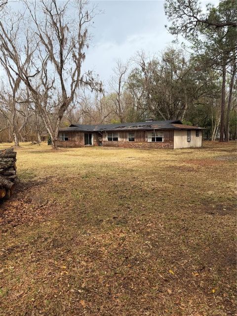 Photo of 1521 SE 163rd Street, Hawthorne, FL 32640 (MLS # GC537848)