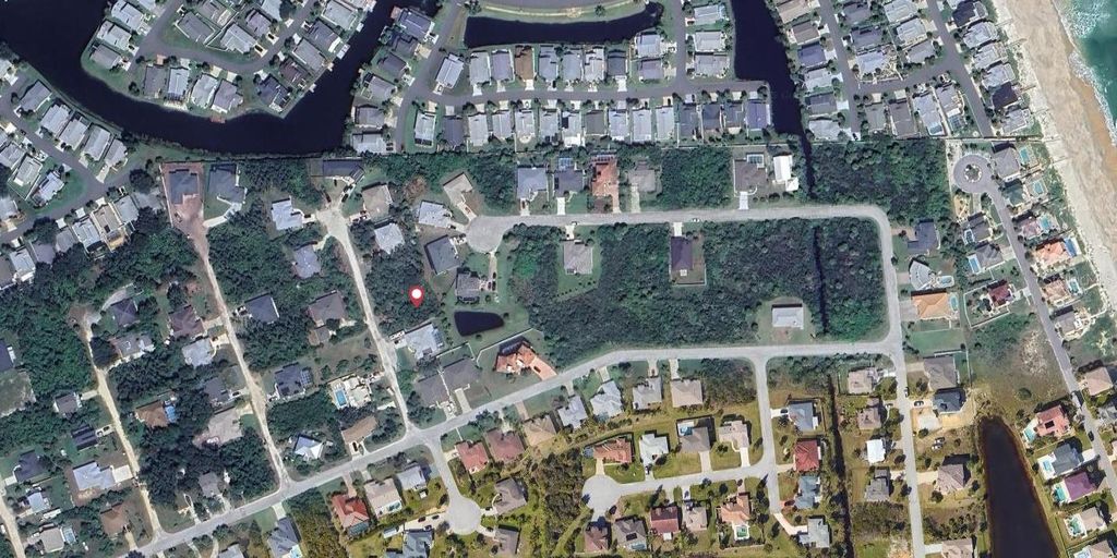 Photo of 5 Dogwood Terrace, Palm Coast, FL 32137 (MLS # FC313298)