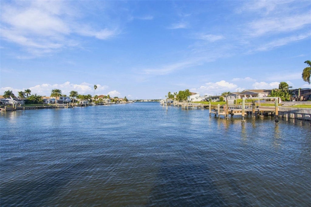 Photo of 11975 7th Street E, Treasure Island, FL 33706 (MLS # TB8556217)