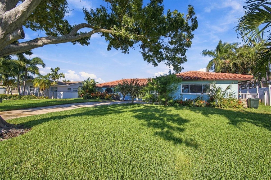 Photo of 11975 7th Street E, Treasure Island, FL 33706 (MLS # TB8556217)