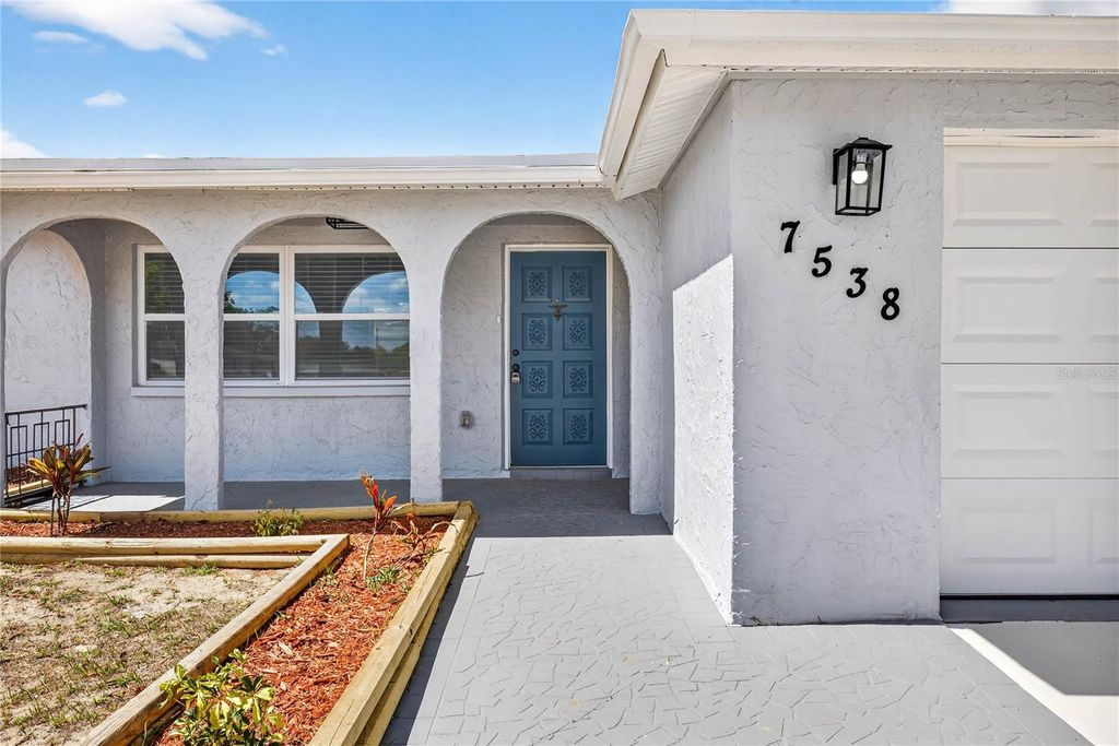 Photo of 7538 Gulf Highlands Drive, Port Richey, FL 34668 (MLS # W7884548)