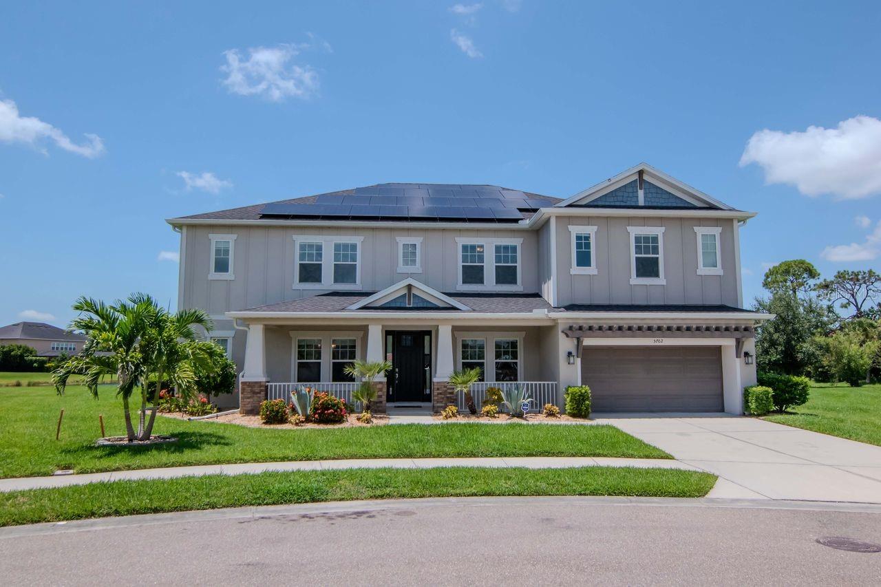 Stunning 6-Bedroom Pool Home with Office, Bonus & Media Rooms, on Oversized Waterfront Lot!
Located on a quiet cul-de-sac and nestled on a pie-shaped lot with breathtaking pond views, this spacious and upgraded single-family home offers 6 bedrooms, 4 full bathrooms, a dedicated office, bonus room, media room, and even a craft room or second office—perfect for today’s flexible lifestyles.
Step inside to discover elegant wood-look tile flooring throughout the main living areas. Just off the entryway, a home office with double doors creates a perfect remote work space. The gourmet kitchen is a showstopper, featuring custom white cabinetry, quartz countertops, a vented hood, natural gas appliances, a beverage refrigerator, and a walk-in pantry with built-in organization. Even the under-stair closet is thoughtfully finished for extra storage.
The first-floor primary suite offers serene pond views, a spa-like bathroom with dual sinks, a step-in shower, and a large walk-in closet. A second bedroom on the main level is conveniently located next to a full pool bath—ideal for guests or multi-generational living.
Upstairs, enjoy a spacious bonus room, a private media room with double doors, and a second primary suite complete with a luxurious bathroom, dual sinks, and walk-in closet. Three additional large bedrooms share a Jack-and-Jill bath, and every room features generous closet space.
Open the collapsible sliding glass doors doors and step into your private outdoor oasis. The oversized screened lanai showcases a saltwater pool with spa and sunshelf, unobstructed picture screen pond views, and ample covered entertaining space, pre-plumbed for an outdoor kitchen.
This energy-efficient home features fully paid solar panels—averaging electric bills of just $27/month—roller shades on all windows, and a 3-car tandem garage equipped with a mini split A/C and EV charging outlet.
With thoughtful upgrades, flexible living spaces, and unbeatable outdoor amenities, this home truly has it all.
Arbor Lakes is located in the heart of Palmer Ranch, one of the most sought-after locations in Sarasota, due to its proximity to numerous dining and shopping venues, top rated schools, 15-20 minute drive to the area’s world-renowned beaches, and with easy access to the interstate and a short commute to vibrant downtown Sarasota and all its recreational and cultural offerings. The community is perfect for multigenerational living, with basketball and volleyball courts, a community pool and splash park, a playground, a dog park, a fire pit, and a pavilion with grills, all for a nominal HOA fee.