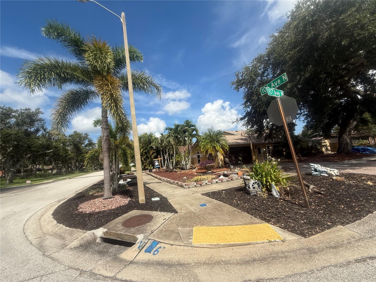 Don’t miss this opportunity to own a charming 3-bedroom, 2-bath home on a beautifully landscaped corner lot in the heart of Seminole, Pinellas County. This spacious property features a large living room with cathedral ceilings that create an open, airy feel, and a bright Florida room at the back of the home, perfect for relaxing or entertaining. The seller is offering a $10,000 credit toward new flooring, making it easy to add your own personal touch. With a little TLC—and the potential to open up the kitchen—this home could truly be transformed into something spectacular. Enjoy peace of mind with a new roof, AC, and water heater installed within the last few years. The backyard offers plenty of space for gardening or outdoor living, and there’s a nice-sized shed for extra storage. Plus, it’s located outside of a flood zone, offering added security and savings. A perfect opportunity for buyers looking to invest in a home with great bones and endless potential!