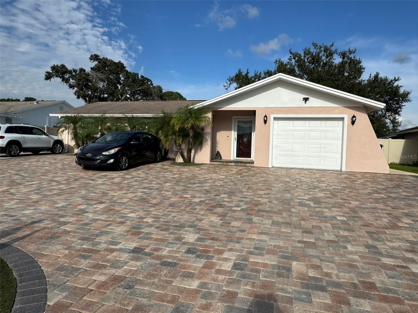Welcome to the lovely community of Carrollwood Meadows in Tampa, Fl! This beautiful home nestles on great sized lot with 4 bedrooms,3 full baths, garage an LARGE AND COMFORTABLE TERRACE WITH ARTIFICIAL GRASS AND HALF BATHROOM FOR PARTIES. THE RENOVATED AND COMFORTABLE KITCHEN WITH QUARTZ, HD lighting, stainless steel appliance set that is open concept to the living room.. PAVER ON THE ENTIRE FRONT OF THE PROPERTY, DON'T WAIT ANY LONGER IT CAN BE YOURS,The community has NO HOA or CDD and conveniently located near the Veterans Expressway, 5 minutes from Citrus Park Mall, surrounded by plenty of restaurants and shopping plazas..PAVER ON THE ENTIRE FRONT OF THE PROPERTY, DON'T WAIT ANY LONGER IT CAN BE YOURS,