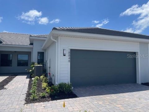 Photo of 18848 Indian Rock Place #18824, Lakewood Ranch, FL 34211 (MLS # TB8436974)