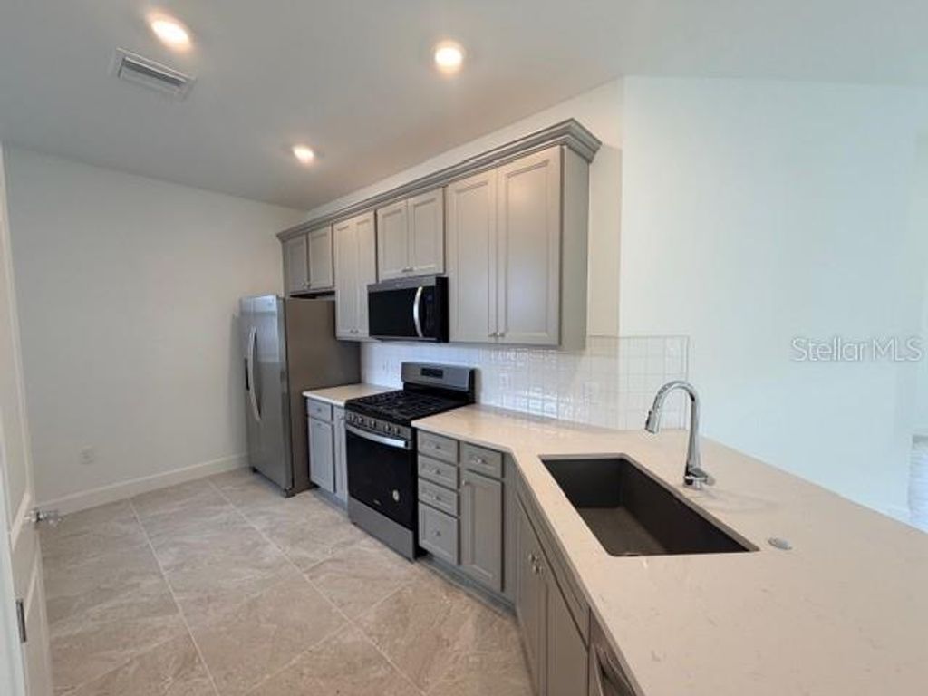 Photo of 18848 Indian Rock Place #18824, Lakewood Ranch, FL 34211 (MLS # TB8436974)