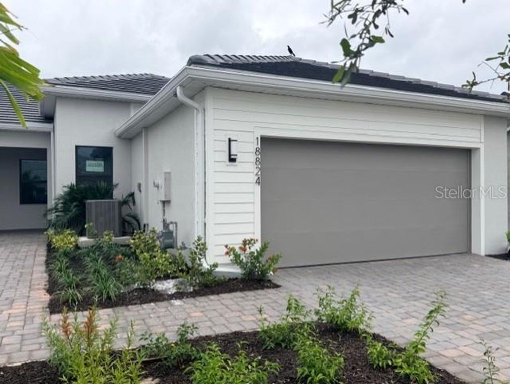 Photo of 18848 Indian Rock Place #18824, Lakewood Ranch, FL 34211 (MLS # TB8436974)