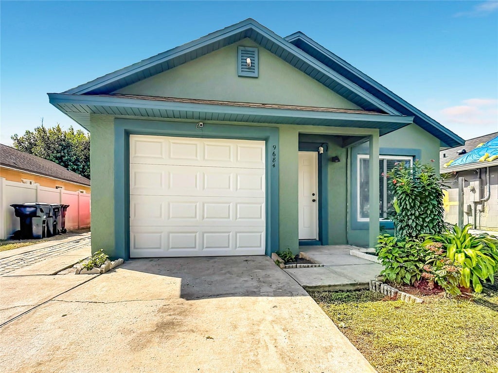 Photo of 9684 Hollyhill Drive, Orlando, FL 32824 (MLS # O6450356)