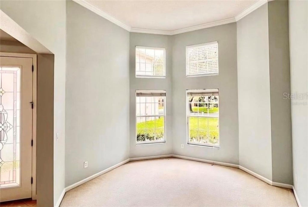 Photo of 10319 Willow Ridge Loop, Orlando, FL 32825 (MLS # O6450086)