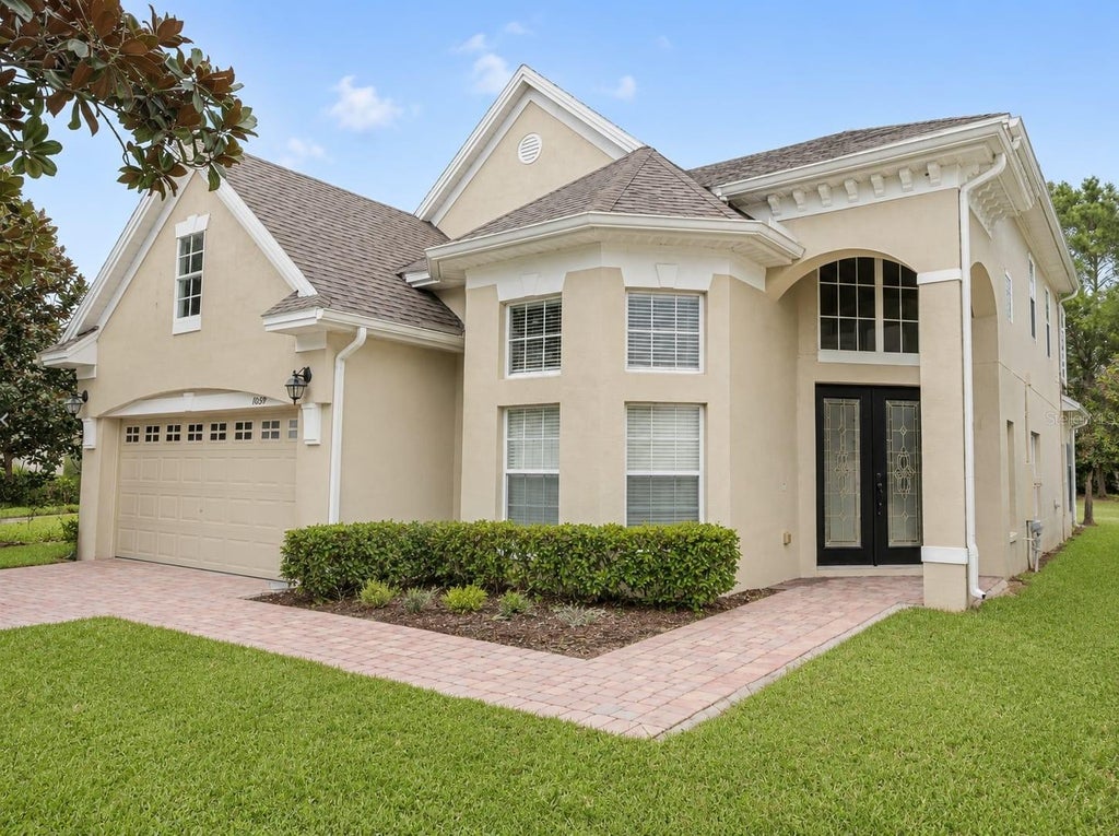 Photo of 10319 Willow Ridge Loop, Orlando, FL 32825 (MLS # O6450086)