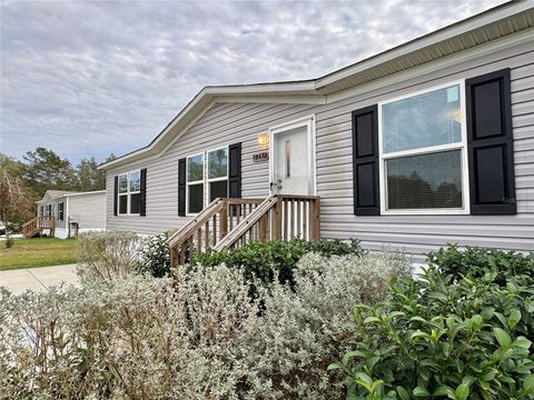 Photo of 18472 SE 58th Place, Ocklawaha, FL 32179 (MLS # O6369939)