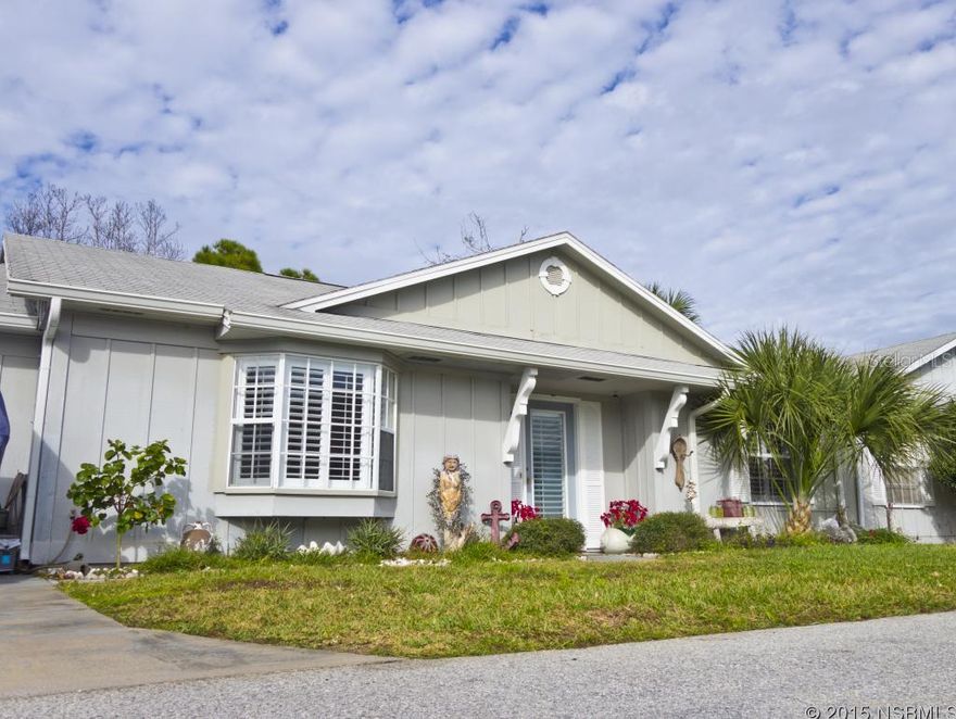 Re-modeled 3/2 on a Kayaking canal with back decks to enjoy nature. Must see interior photos to appreciate the upgrades. Special features include; Wood Floors in the living area, Open kitchen with granite center island,wood cabinets with glass fronts, French doors lead to the Florida Room, decks across the backyard canal to view birds or feed the turtles from, inside laundry room and a quiet community.  MEMBERSHIPS AVAILABLE AT COMMUNITY POOL. ;Water: City