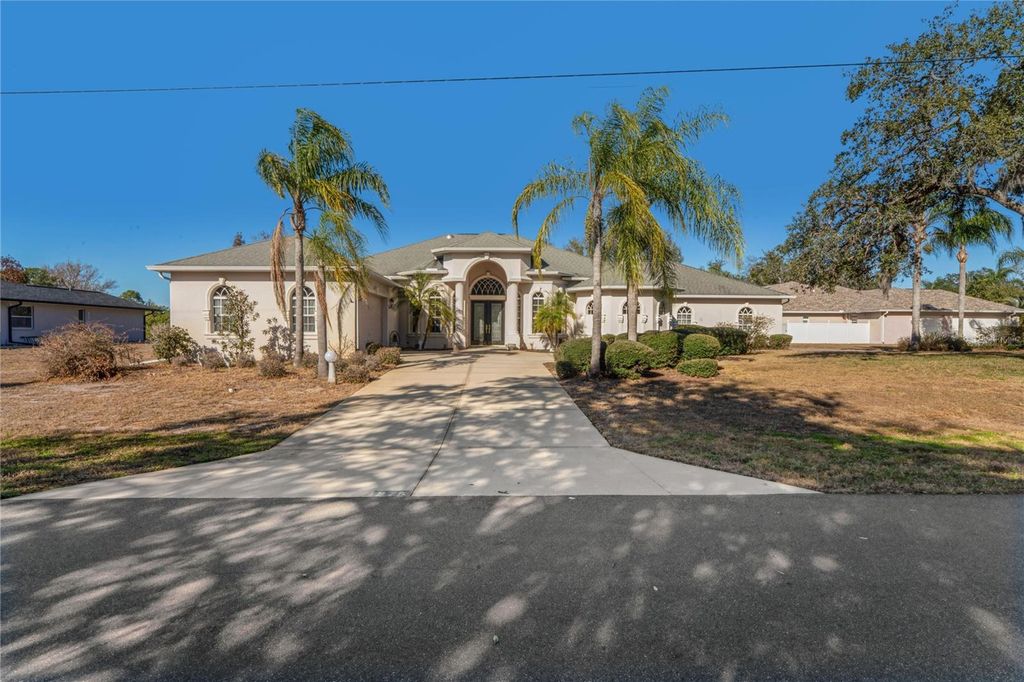 Photo of 275 Planter Road, Spring Hill, FL 34606 (MLS # W7882369)