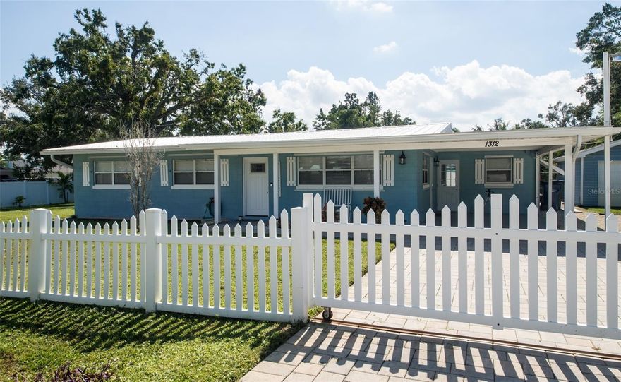 Come view this beautiful turnkey home, with a detached garage. Beautiful updated kitchen, where it blends Old Florida charm with modern day amenities. Being zone RSF-4 you could possibly turn the detached garage into an accessory dwelling. The large lot offers plenty of parking for a boat, RV with ample additional parking.  Very close proximity to the water makes it super desirable for boat enthusiasts. Outside of the home is a tropical oasis, take a dip in the beautiful heated pool, the fenced in yard lends itself for your pets to enjoy as well. The yard is a wonderful setting to dine alfresco, play games and make the most of the outdoors.