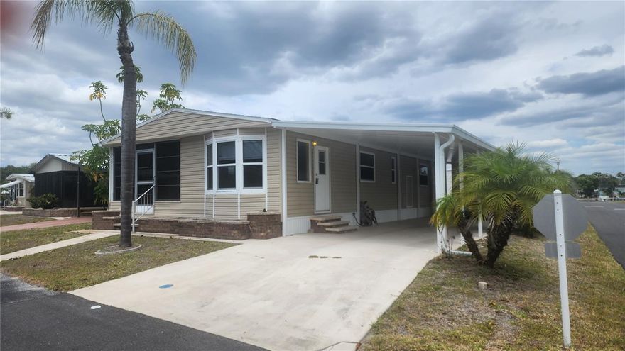Welcome to 157 N Fiji Circle located on a CORNER LOT in the highly desirable Polynesian Village community of Englewood—just 4 minutes from the beautiful shores of Manasota Key Beach.  Enjoy peace of mind with a newer Roof replaced in June 2024, newer vinyl windows, vinyl siding, newer refrigerator, all appliances in working condition, water heater approx 5 yrs old, new carport and shed for storage with washer, dryer and utility sink and an outdoor shower. Relax and unwind in the front sun-filled Florida Room. Whether you're a seasonal resident looking for a winter retreat or seeking a comfortable full-time residence, this thoughtfully designed home fits the bill. A brand-new carport was installed and there is a spacious storage shed—offering ample room for beach gear, bikes, tools, or extra storage needs. Polynesian Village is known for its friendly, active atmosphere. Residents enjoy a screened-in community pool and a brand-new Tiki Hut that serves as the hub for social gatherings and live music. A unique feature of the community is its large, dedicated storage area for boats, trailers, and recreational toys—available to residents for minimal fees. Some owners even utilize portions of this space for hobbies such as woodworking, adding to the neighborhood’s vibrant and engaged feel. With its prime location just minutes to the beach, dining, and local attractions, this is Florida living made simple. Don’t miss the opportunity to own a nearly new home in one of Englewood’s most social and sought-after communities.
