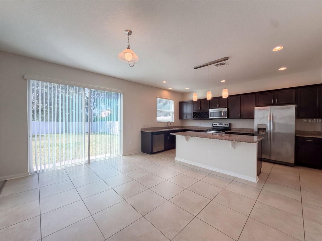 Photo of 7607 Tangle Rush Drive, Gibsonton, FL 33534 (MLS # O6447501)