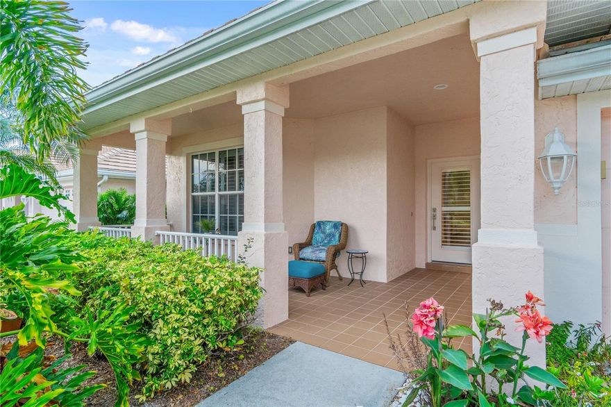 Enjoy this private gated and beautifully landscaped community with sidewalks, pond fountains, park benches, and lantern-lit streets. This recently painted, meticulously maintained home is at the end of a private cul-de-sac and offers the perfect blend of comfort and style. Inside, you’ll find move-in ready 3 bedrooms, 2 full baths, impact glass windows, plantation window shutters, crown molding, tray ceilings, and updated plank ceramic tile flooring. A full-sized laundry room with cabinets and utility sink adds convenience. The covered front porch leads into a spacious foyer with arched doorways, tray ceiling and welcoming wet bar. The well-equipped kitchen is designed for entertaining, featuring ample cabinets, pull out sliding shelving, a serving island, breakfast bar, tray ceiling and dinette area. The open living space has ceramic tile plank flooring and flows seamlessly to the outdoors through triple sliding glass doors. Step onto the expansive wrap-around screened lanai with a private spa looking out to the attractive pond with lighted fountain—ideal for morning coffee or relaxing evenings. The spacious master suite with double sliders offers lanai access, a walk-in closet, and a private en-suite bath with double sinks and a Roman walk-in shower. A split-bedroom layout ensures privacy for guests, with two additional bedrooms and a conveniently located full guest bath. Quality curb appeal includes a tile roof, mature landscaping, inviting front porch, long and wide expanded driveway.
Community amenities include resort-style tropical pool with sundeck, clubhouse with fitness room, library, and billiards, patio with tables and umbrellas. Whether living here full-time or seasonally, you’ll enjoy a low-maintenance lifestyle with low HOA fees, no CDD fees, and X flood zone. Centrally located just 15 minutes to Wellen Park, golf, beaches, MLB spring training baseball, boat launches, world class fishing, biking and walking paths, shopping, and medical facilities.