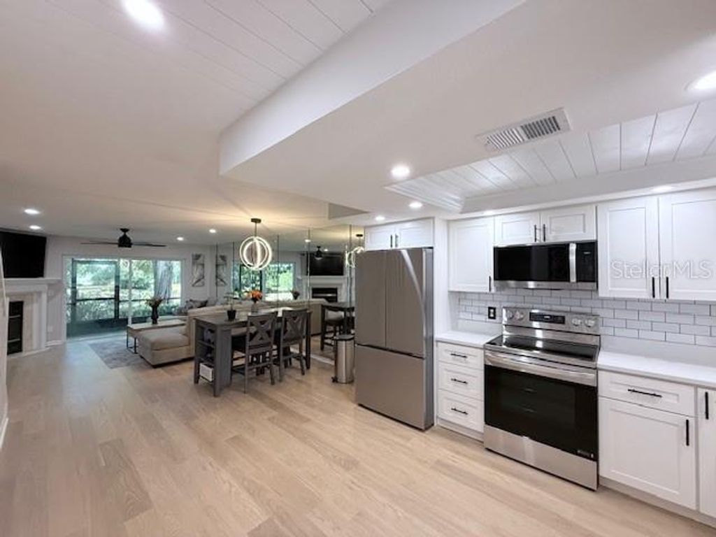 Photo of 1909 Whitney Way, Clearwater, FL 33760 (MLS # TB8448470)