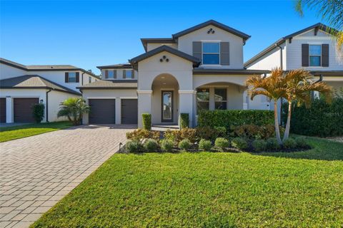 Photo of 9392 Juniper Moss Circle, Orlando, FL 32832 (MLS # O6375665)