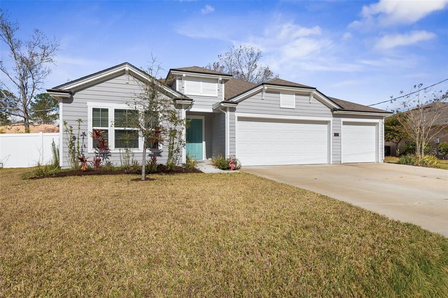 New from 2022, 11 Pittson Ln offers modern design, thoughtful upgrades, and a prime Palm Coast location close to beaches, trails, schools, shopping, and dining. This 3-bedroom, 3-bathroom home features an open floor plan with high vaulted ceilings that create a bright, spacious feel throughout. A dedicated office/flex room with French doors provides versatility for remote work, a guest space, or a formal sitting area.
The main living area flows seamlessly to the outdoors through a 3-panel sliding glass door, leading to a covered lanai with a new screen enclosure (2023)—perfect for relaxing or entertaining. The open concept main spaces are designed for everyday comfort and hosting alike, while new carpet in the bedrooms adds warmth and comfort.
The private primary suite showcases a tray ceiling, walk-in closet, dual sinks, and a spacious step-in shower. Additional bedrooms and bathrooms are thoughtfully positioned to provide privacy and convenience for family or guests.
Outside, enjoy a fully fenced backyard with a new vinyl fence (2023). An oversized driveway and a 3-car garage offer ample storage and parking. Conveniently located near Flagler Beach, scenic walking and biking trails, top-rated schools, restaurants, and shopping, this home delivers the perfect blend of modern living and coastal lifestyle.
Don’t miss the opportunity to own this better-than-new Palm Coast home in a sought-after location.