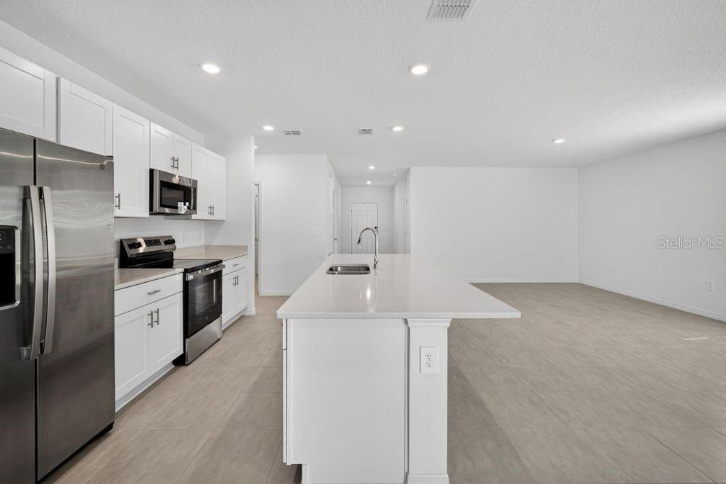 Photo of 13643 Tropical Breeze Way, Hudson, FL 34669 (MLS # TB8488041)