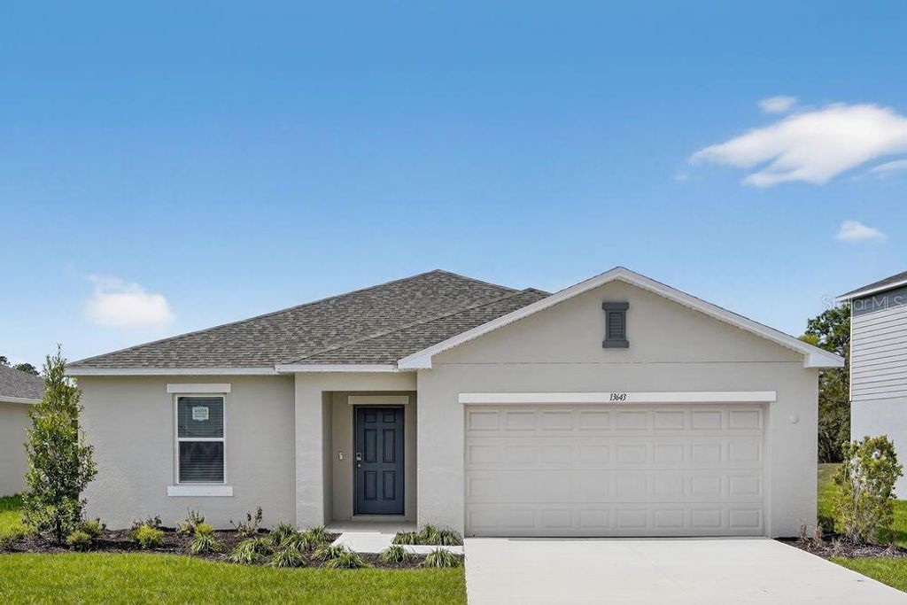 Photo of 13643 Tropical Breeze Way, Hudson, FL 34669 (MLS # TB8488041)