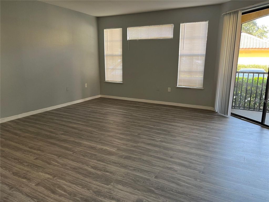 Photo of 6157 Metrowest Boulevard #101, Orlando, FL 32835 (MLS # O6374730)