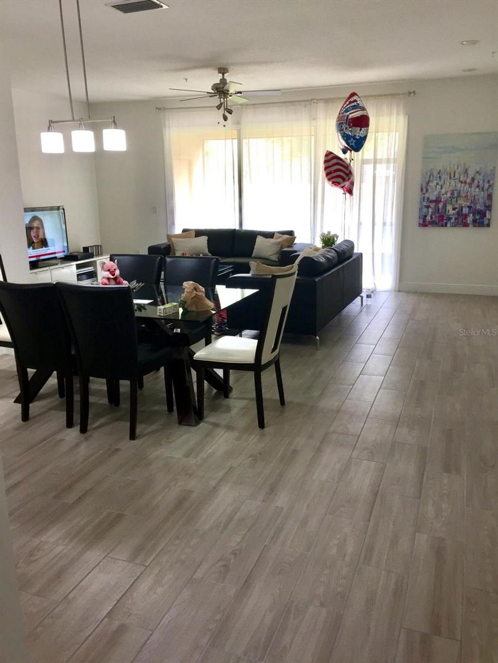 Photo of 2922 Ashland Lane S, Kissimmee, FL 34741 (MLS # O6389116)