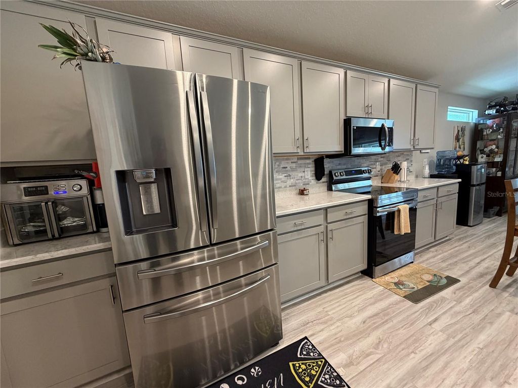 Photo of 1358 Cascade Drive, Davenport, FL 33837 (MLS # O6406525)
