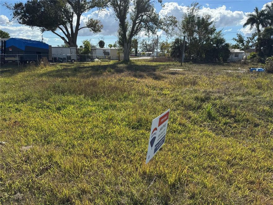 Looking for that spot to place your mobile home or RV??  This parcel is a double lot, with water, electricity and sewer available.  Located near the Myakka River Bridge on 776, it is within easy access to shopping, golf, restaurants, beaches and the airport!  The Myakka River is close for fishing.  Come check it out!