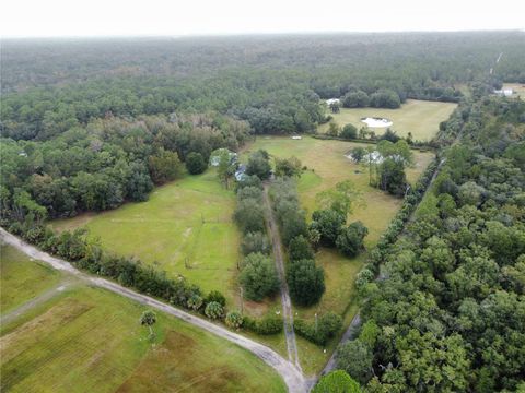 Photo of 530 Rebel Run, Osteen, FL 32764 (MLS # O6353827)