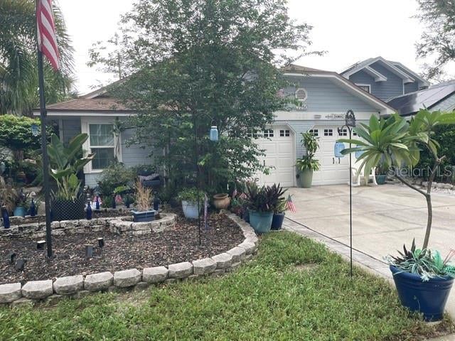 Photo of 2250 Springwood Cir W, Clearwater, FL 33763 (MLS # TB8530034)
