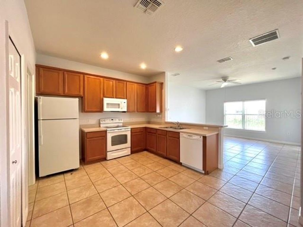 Photo of 697 Hacienda Circle, Kissimmee, FL 34741 (MLS # S5147820)